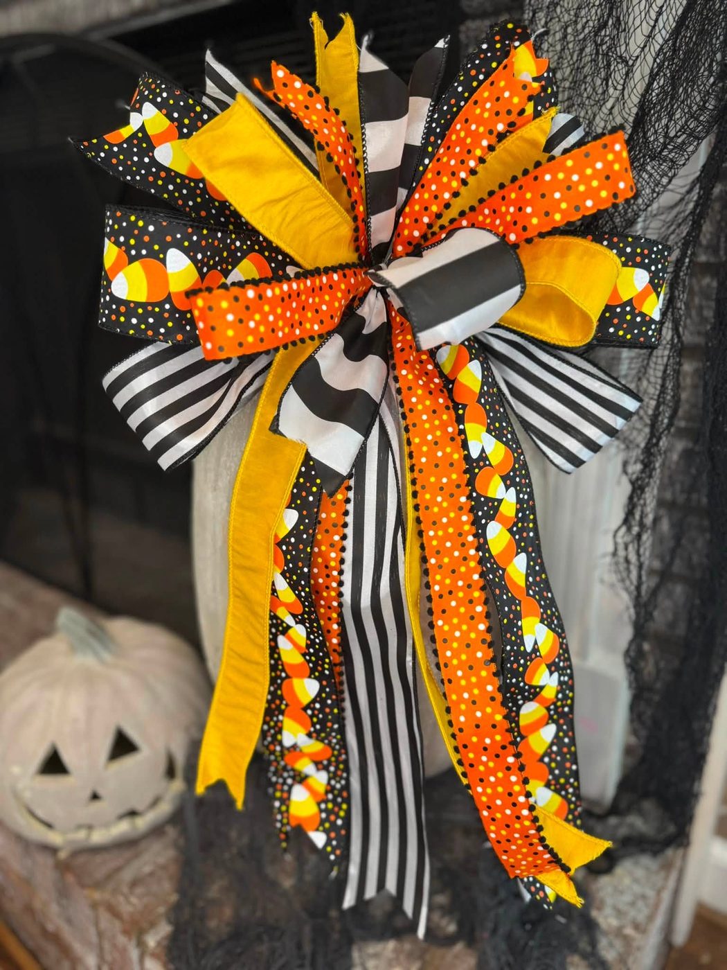 Candy corn and black striped bow with mustard velvet ribbon