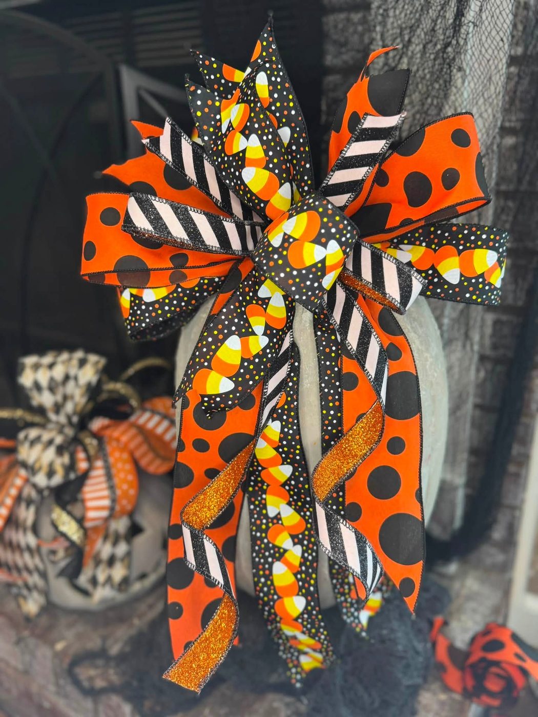 Orange and black polka dot bow with glitter ribbon